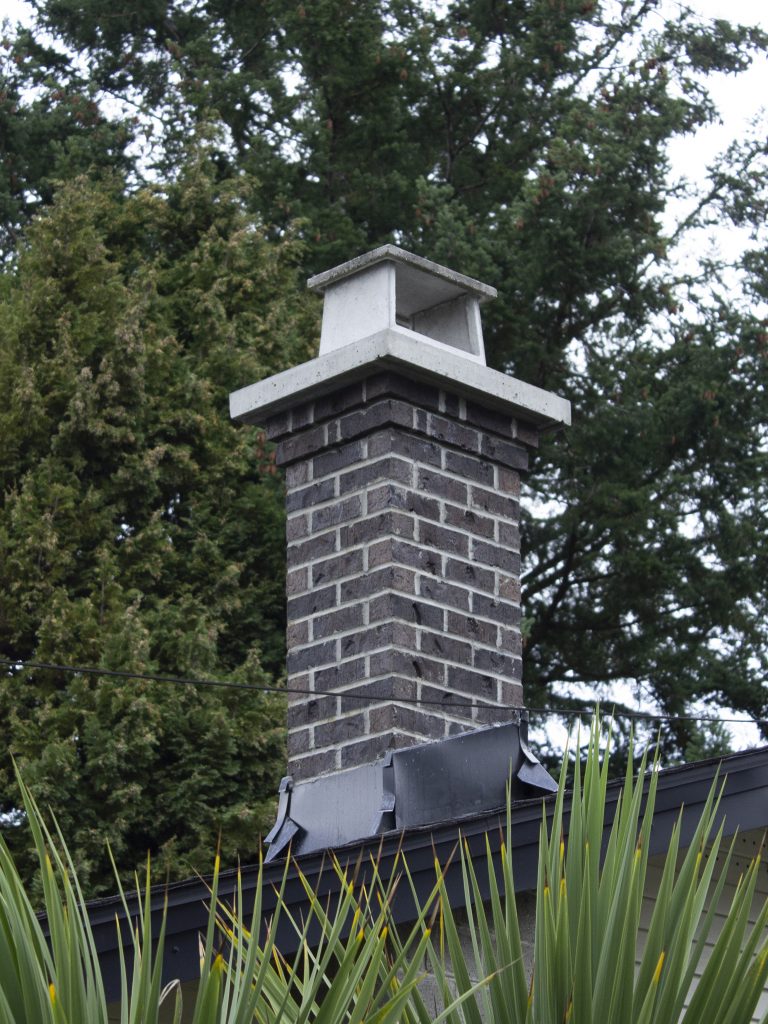 Clinker brick chimney with corbel detail