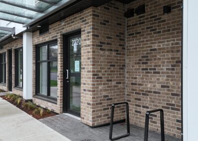 Completed commercial CMU block and brick veneer masonry at 2120 Quadra Street, Victoria, BC – project by Orca Masonry