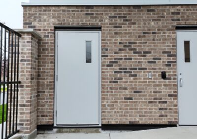 Completed commercial CMU block and brick veneer masonry at 2120 Quadra Street, Victoria, BC – project by Orca Masonry