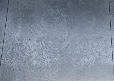 Stamped concrete patio finished with an Oxford Slate pattern. Durable, low-maintenance, and ideal for outdoor living spaces across Victoria and Vancouver Island.