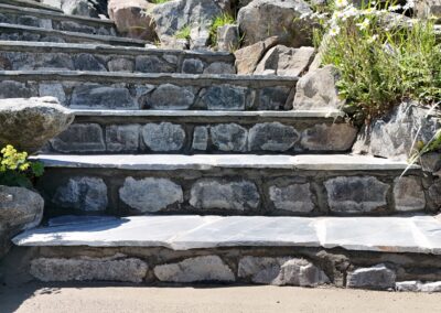 San Juan Flagstone steps installed by Orca Masonry in Cordova Bay. Premium blue-grey slate, ideal for ocean-view homes. Stonework done right in Victoria, BC.