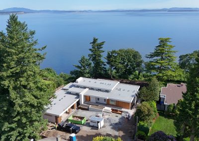 Exterior white brick façade on modern custom home in Victoria by Orca Masonry
