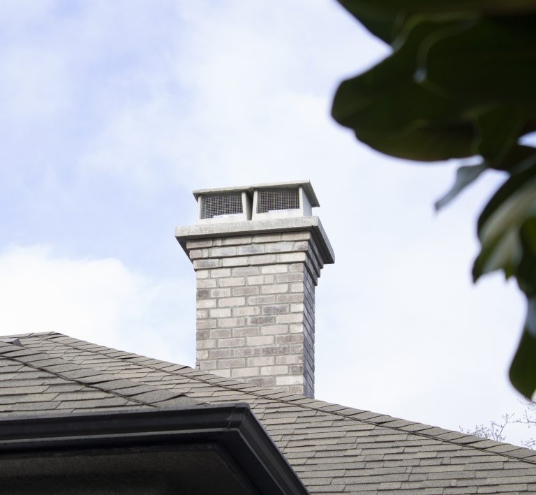 West Port grey brick chimney with corbel detail