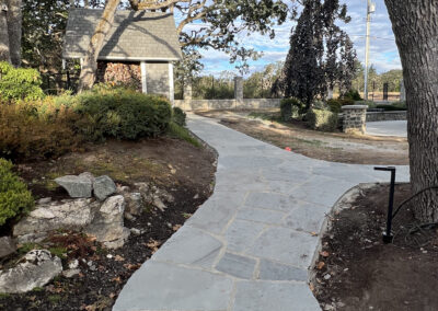 Custom bluestone pathway installed by Orca Masonry in Victoria, BC, combining durability with a natural aesthetic