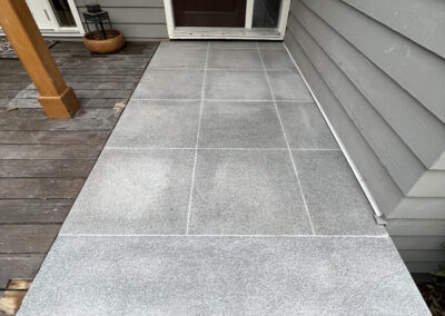 Premium grey granite steps and walkway installed for a modern outdoor space in Victoria, BC.