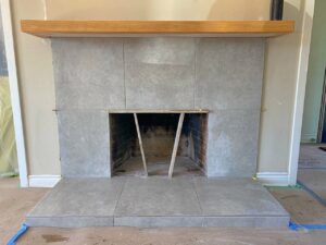 Modern Fireplace Renovation with Large-Format Tile | Orca Masonry, Victoria BC