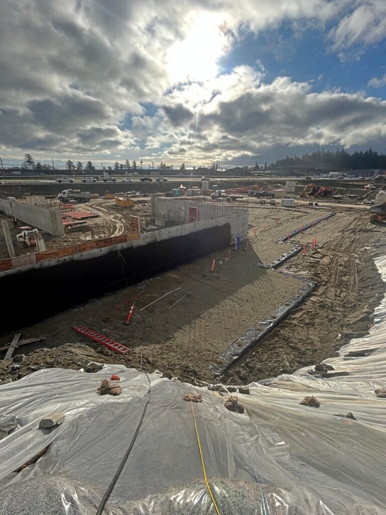 Waterproofed foundation wall and excavation seen from above