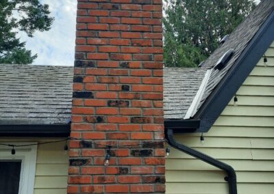 Chimney Rebuild with Reclaimed Brick