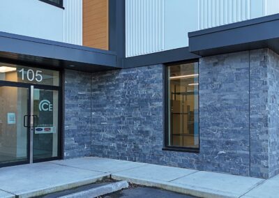 Expert stone veneer cladding for commercial projects, ensuring durability and waterproofing.
