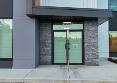Expert stone veneer cladding for commercial projects, ensuring durability and waterproofing.