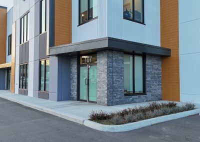 Expert stone veneer cladding for commercial projects, ensuring durability and waterproofing.