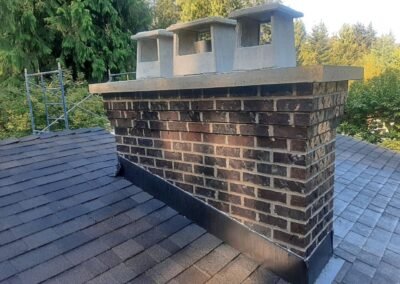 Dark Flashed Brick With Corbel and Concrete Crown