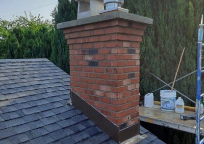 Heritage Flashed Red Brick With Multi-Step Corbel and Concrete Crown