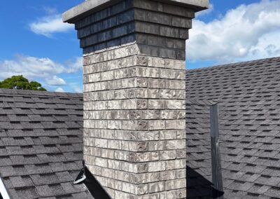 Textured Grey Brick With Corbel and Concrete Crown