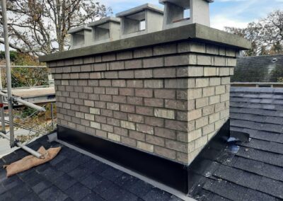 Light Grey Textured Brick With Corbel and Concrete Crown