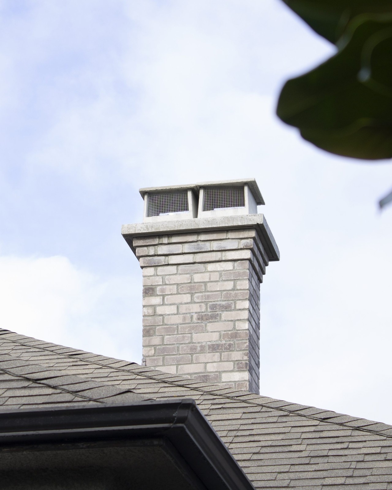 Chimney built by Orca Masonry in Westport Used brick