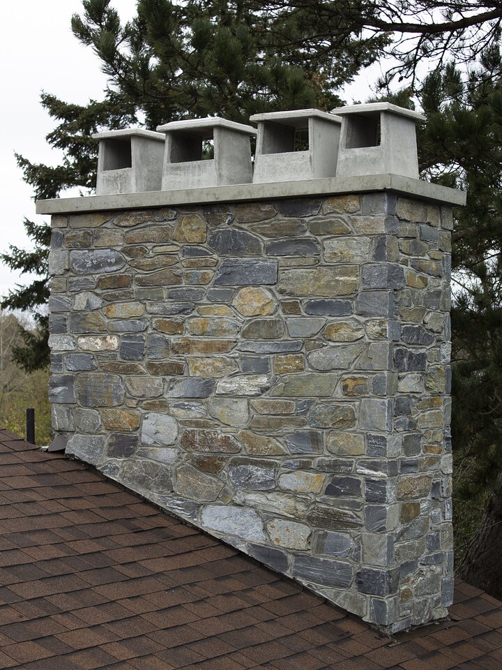 Natural Ledge Stone chimney rebuilt by Orca Masonry