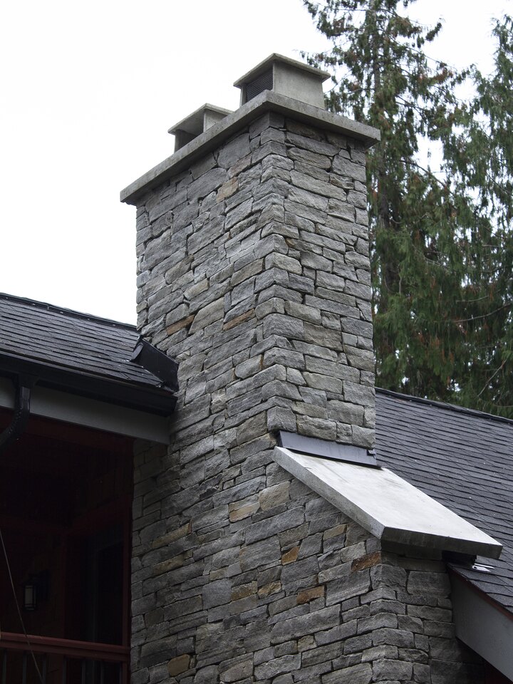 New England Quarry Ledge Stone chimney rebuilt by Orca Masonry
