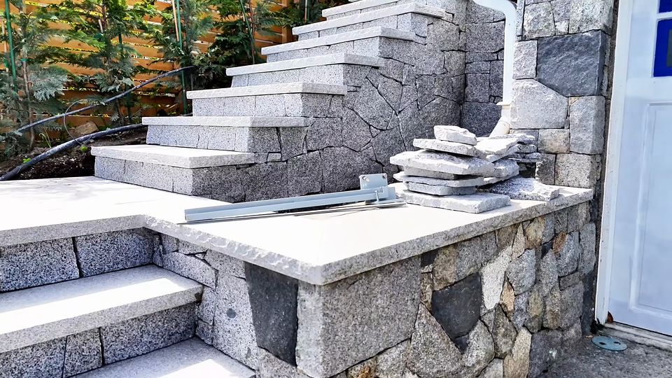 Video: a granite staircase with hardy granite treads leading down to Cordova Bay Beach